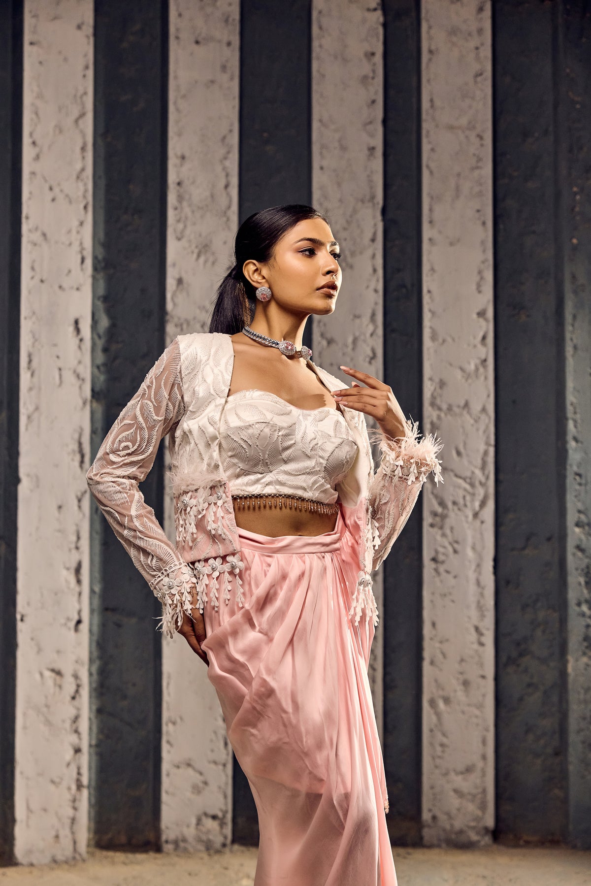 WHITE CROP JACKET WITH COSRET AND WRAP A ROUND DRAPE SKIRT-   SOT 06