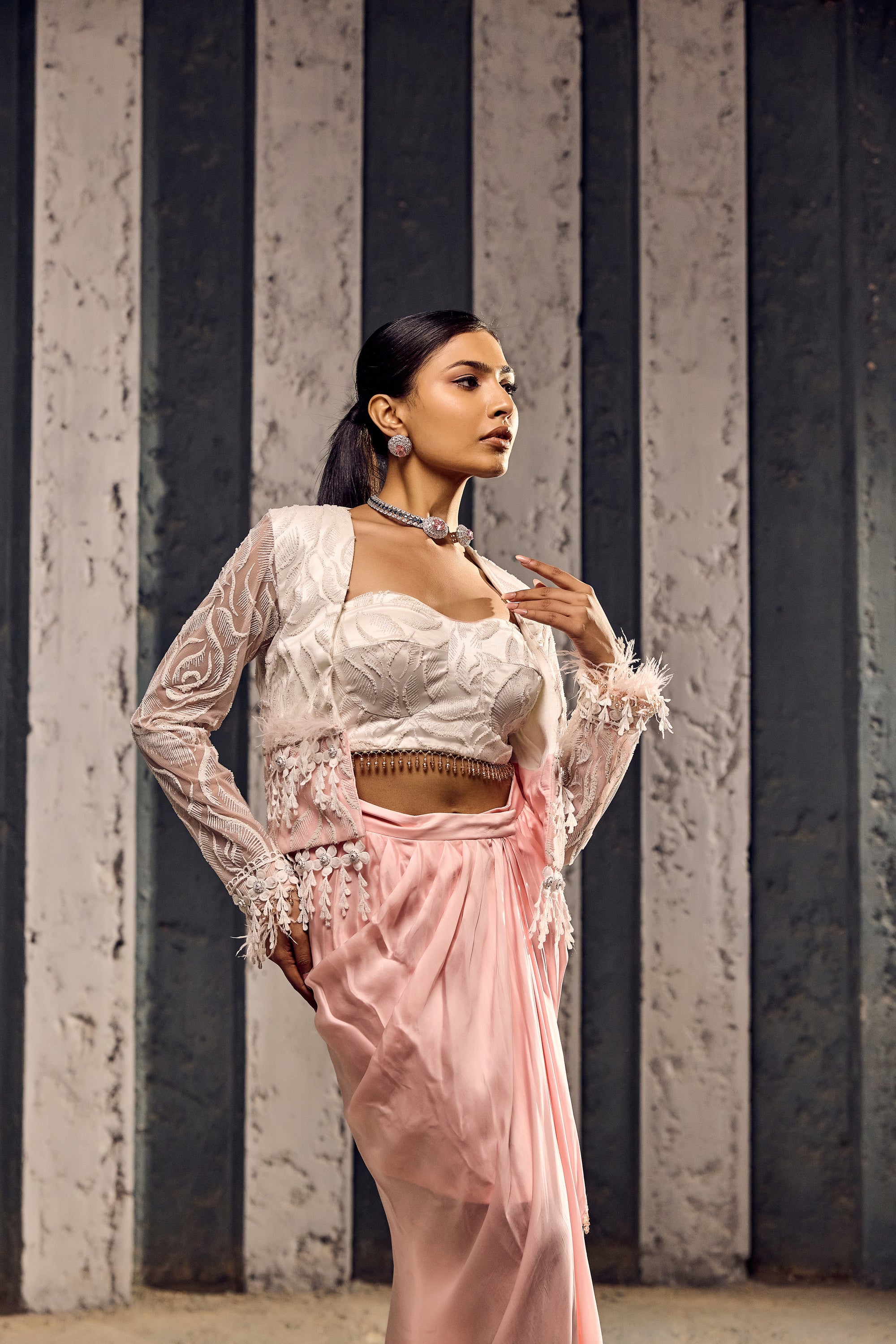 WHITE CROP JACKET WITH COSRET AND WRAP A ROUND DRAPE SKIRT-   SOT 06