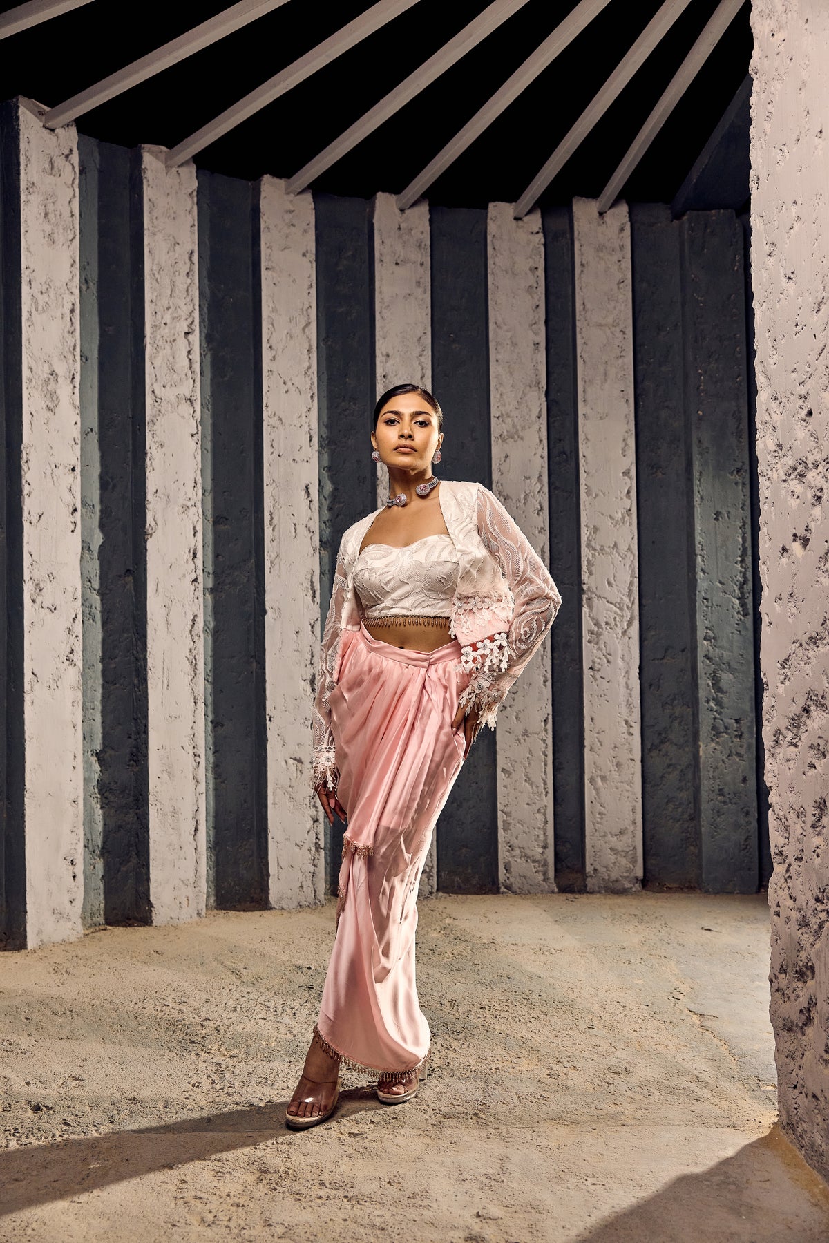 WHITE CROP JACKET WITH COSRET AND WRAP A ROUND DRAPE SKIRT-   SOT 06